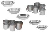 Aluminum mugs, plates and cups of different sizes.