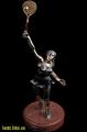 bronze sculpture of a football player, a bronze statuette poker star 