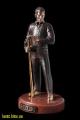 bronze sculpture of a football player, a bronze statuette poker star 