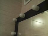 Make-up mirror,dressing room with lamps on perimetre. 