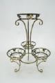Country wrought iron stand with wooden planters for flowers. 