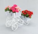 Country wrought iron stand with wooden planters for flowers. 