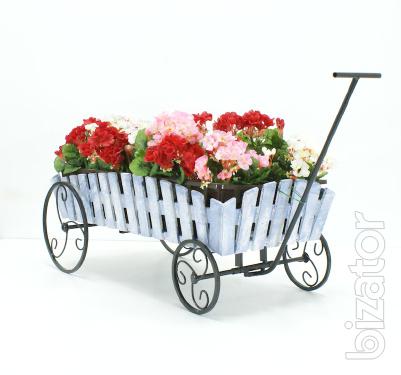 Country wrought iron stand with wooden planters for flowers. 