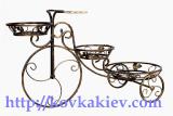 Wrought iron stand for flowers Bikes.
