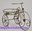 Wrought iron stand for flowers Bikes. 