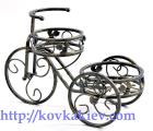 Wrought iron stand for flowers Bikes. 