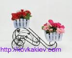 Wrought iron stand for flowers Bikes. 