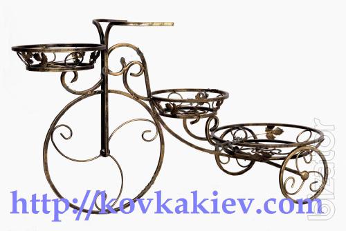 Wrought iron stand for flowers Bikes. 