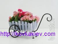 Wrought iron stand for flowers Bikes. 