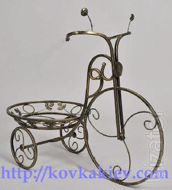 Wrought iron stand for flowers Bikes. 