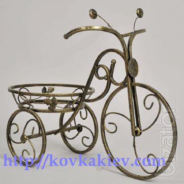 Wrought iron stand for flowers Bikes. 