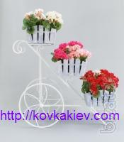Wrought iron stand for flowers Bikes. 