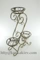 Stands for flowers forged under three of the flowerpot. 