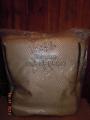 Sleeping bag on a sheepskin for carriages, sledges, car seats 