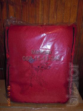 Sleeping bag on a sheepskin for carriages, sledges, car seats 