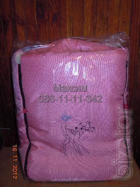 Sleeping bag on a sheepskin for carriages, sledges, car seats 