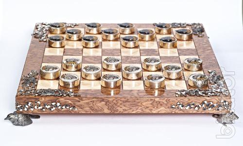 Produced chess, backgammon and checkers. 