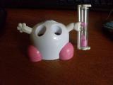 The toothbrush holder with sand watch 