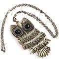 Vintage folding pendant "owl" on a long chain