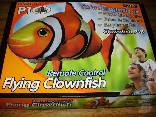 Sell flying fish Air Swimmers Shark and clown Fish" . There are 2 pieces each. 