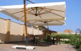 The sun umbrellas. Umbrellas for cafes, bars and restaurants.