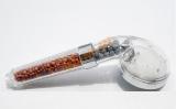 Shower filter with mineral filler ionizer.
