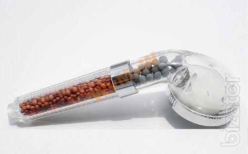 Shower filter with mineral filler ionizer. 