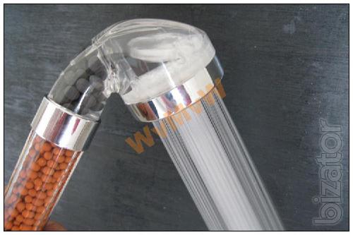Shower filter with mineral filler ionizer. 
