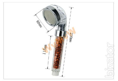 Shower filter with mineral filler ionizer. 