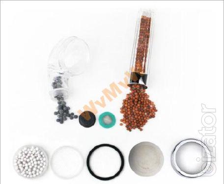Shower filter with mineral filler ionizer. 