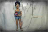 The doll in the photo.Portrait of textile cook