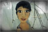 The doll in the photo.Portrait of textile cook