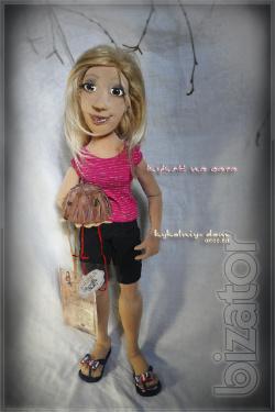 The doll in the photo.Portrait of textile cook