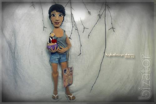 The doll in the photo.Portrait of textile cook