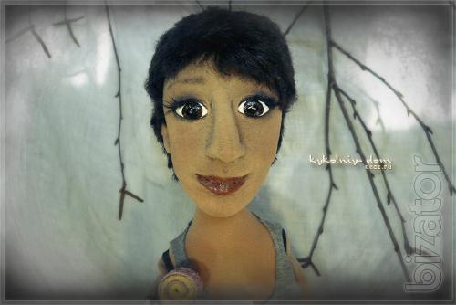 The doll in the photo.Portrait of textile cook