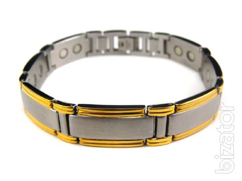 The magnetic bracelets from stainless steel or titanium with a coating of gold 