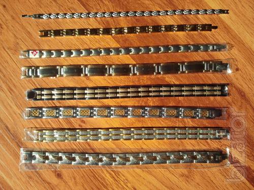 The magnetic bracelets from stainless steel or titanium with a coating of gold 
