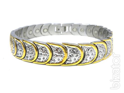 The magnetic bracelets from stainless steel or titanium with a coating of gold 