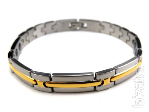 The magnetic bracelets from stainless steel or titanium with a coating of gold 