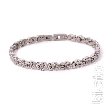 The magnetic bracelets from stainless steel or titanium with a coating of gold 