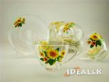 Tableware made of glass. Cups, mugs, tea sets, wine glasses made of glass. 