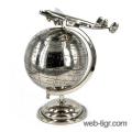 The metal globe with airplane