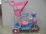 The bike is A 611-1 M/ 6014 with toys on the steering wheel 
