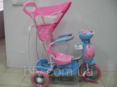 The bike is A 611-1 M/ 6014 with toys on the steering wheel 