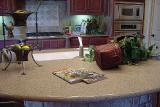 Countertops, window sills, fireplaces, stairs made of stone. 