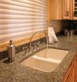 Countertops, window sills, fireplaces, stairs made of stone. 