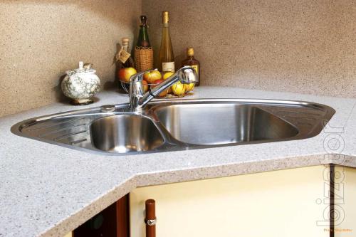 Countertops, window sills, fireplaces, stairs made of stone. 