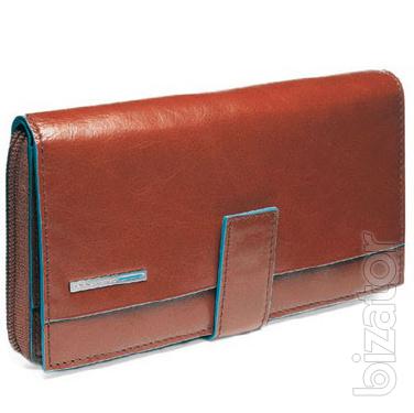 Women's purses and wallets made of genuine leather 