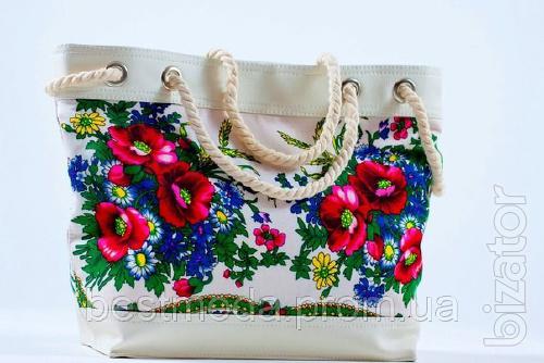 The beach bag is in the style of Matryoshka 