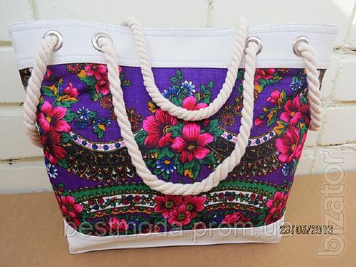 The beach bag is in the style of Matryoshka 